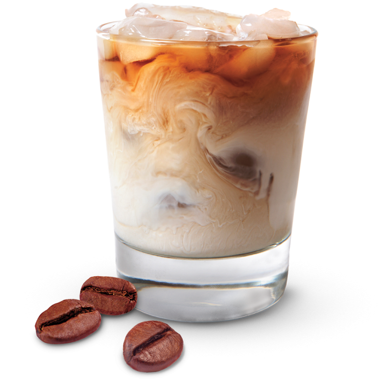 a glass filled with ice and coffee beans