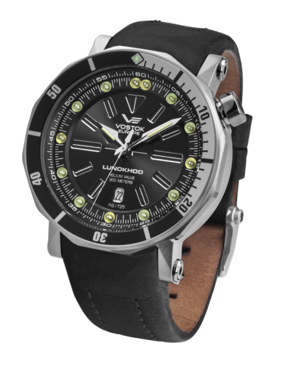 a watch with black leather strap and green numbers