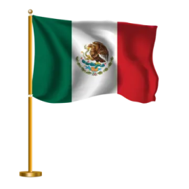 a mexican flag flying in the wind