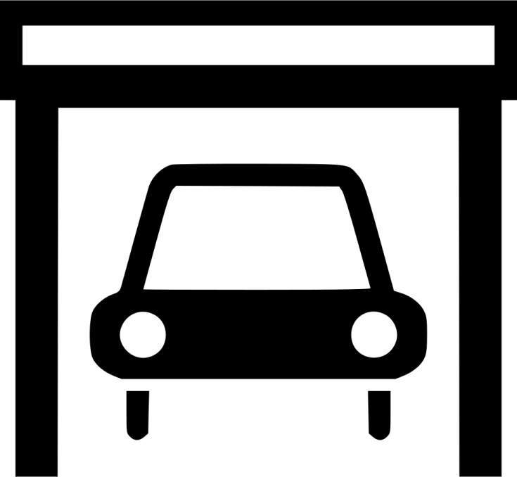 a black and white image of a car in a garage
