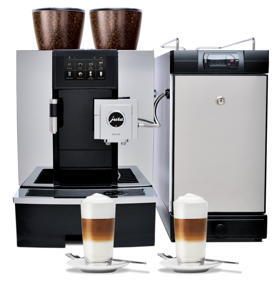a coffee machine with two cups next to it