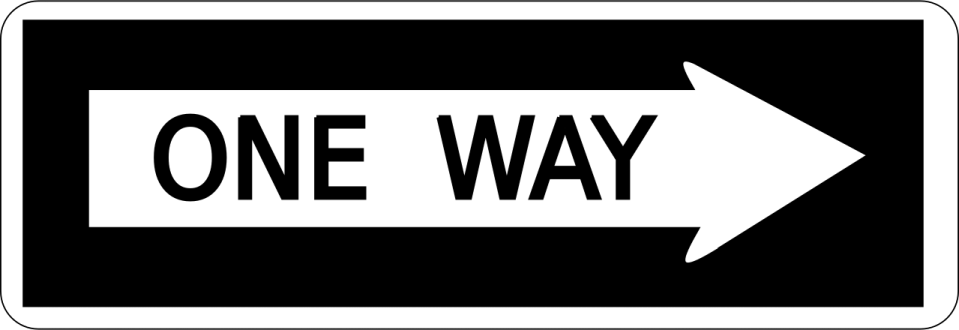 a one way sign with an arrow pointing left