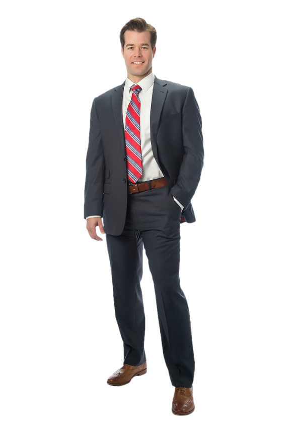 a man in a suit and tie standing
