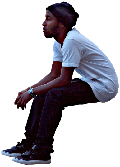 a man sitting on top of a skateboard