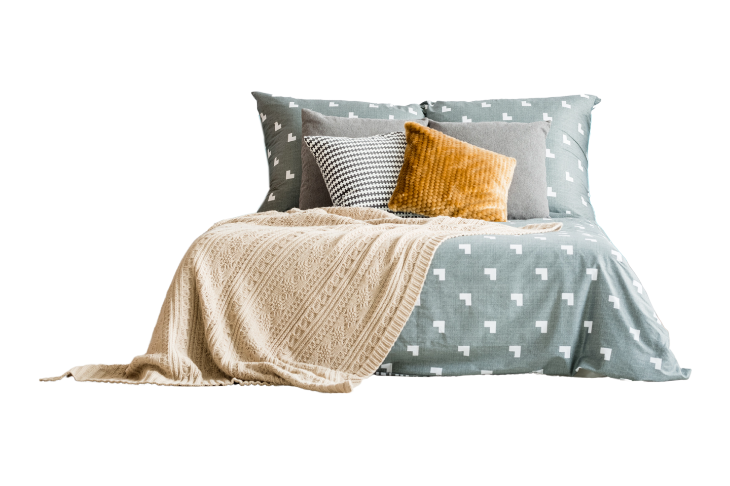 a bed with two pillows and a blanket
