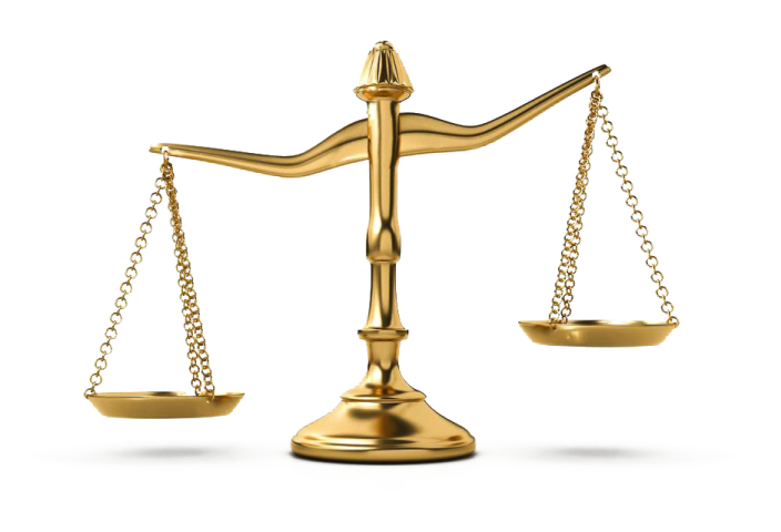 a golden balance scale on a white background