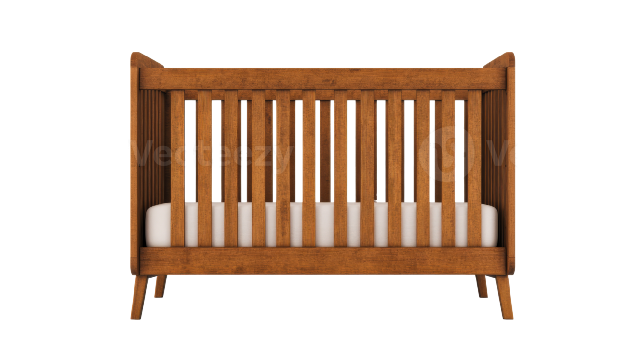 a wooden cribt with white sheets on it