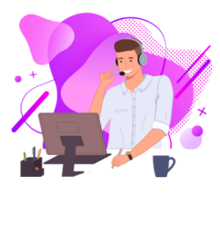 a man sitting at a desk with a laptop and headphones