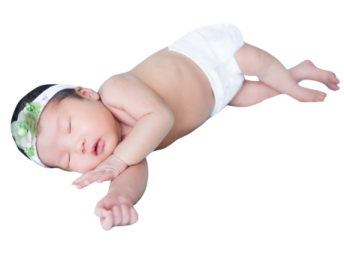 a baby in a white diaper with a green headband