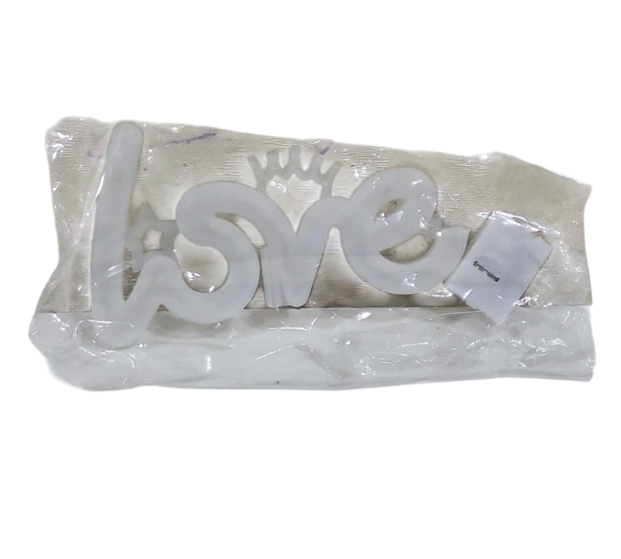 a white plastic bag with the word love on it