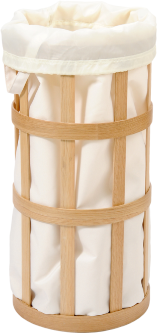 a white laundry basket with wooden handles