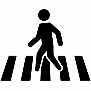 a person walking across a crosswalk