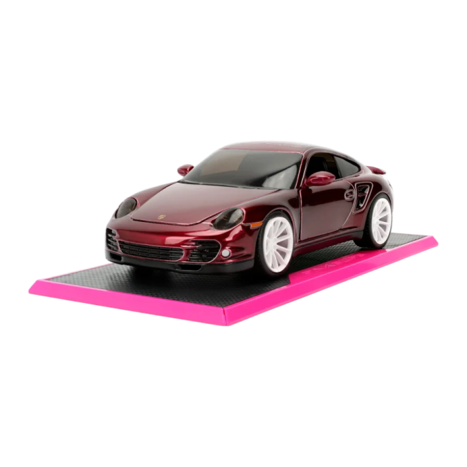 a red toy car on a white background