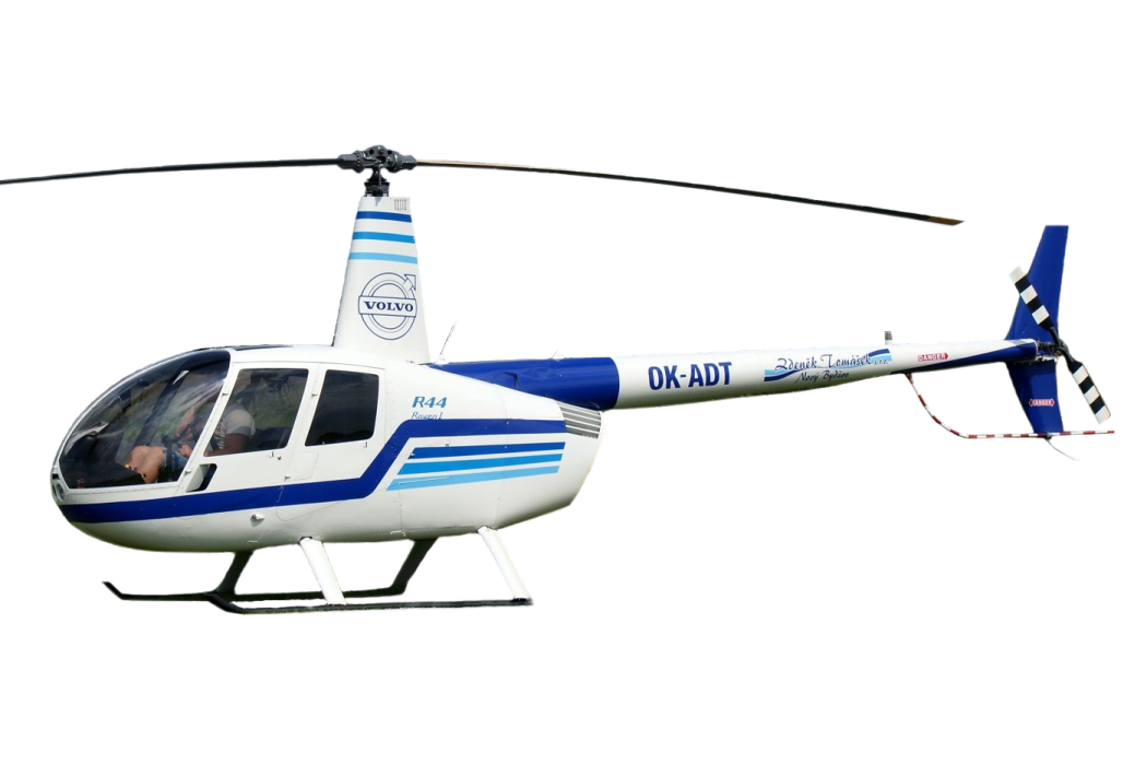 a white and blue helicopter flying through the air