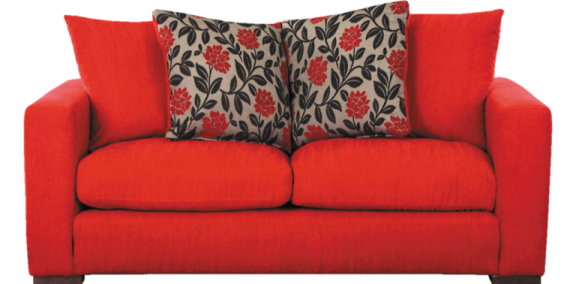 a red couch with two pillows on it