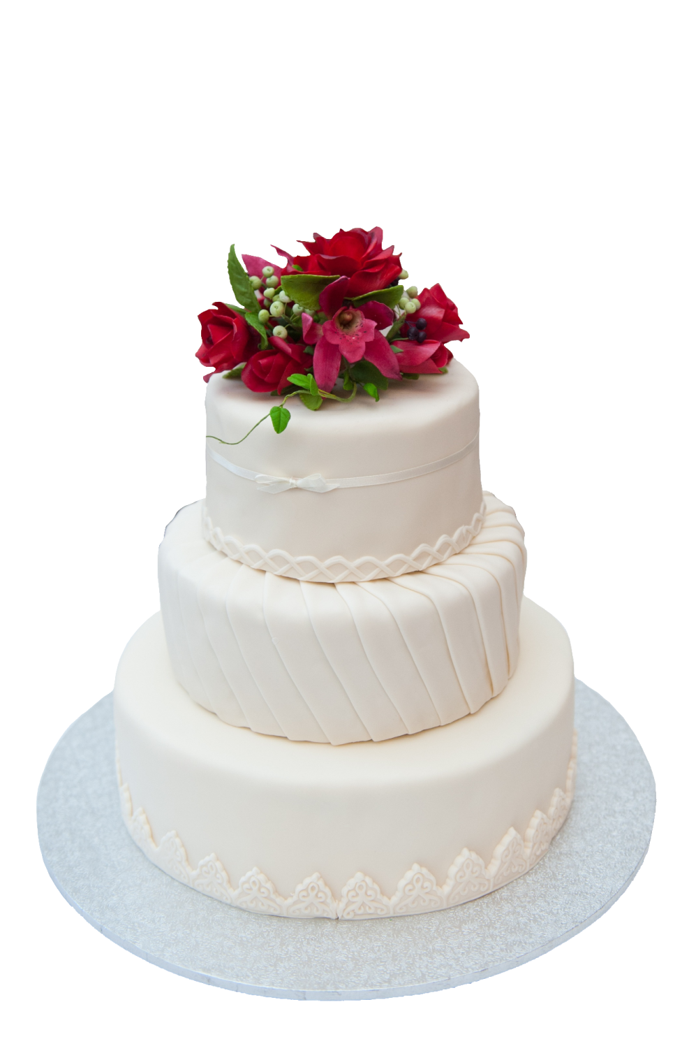 a white wedding cake with red flowers on top