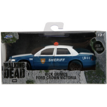 a blue and white police car on a white background