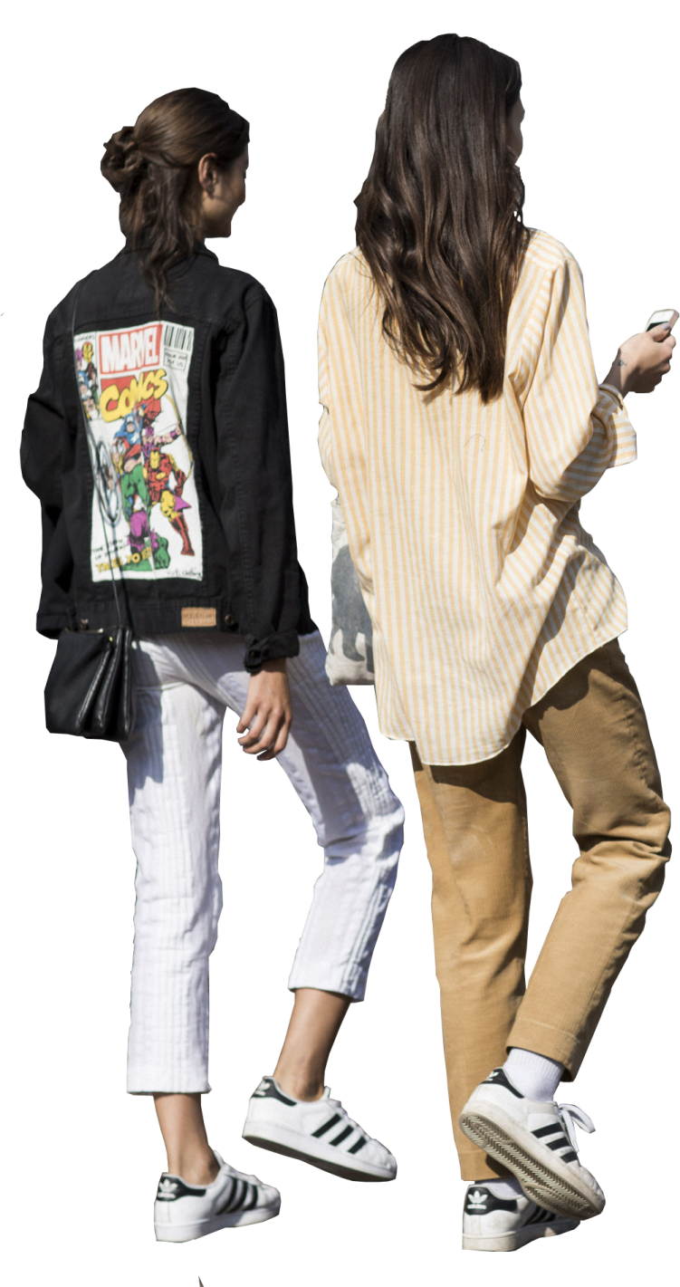 a couple of people walking down a street