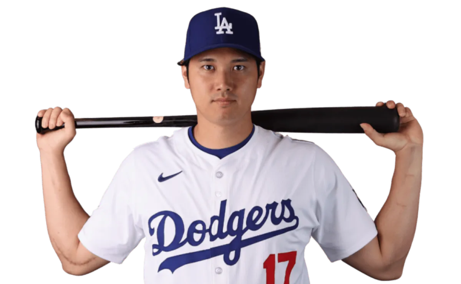 a man holding a baseball bat in his hands