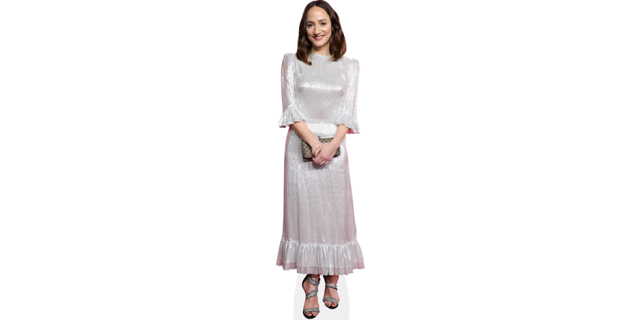 a woman wearing a white dress and black sandals