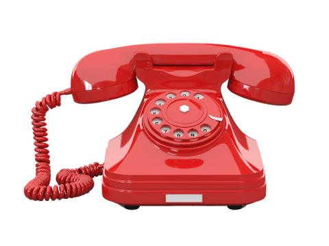 an old red telephone on a white background