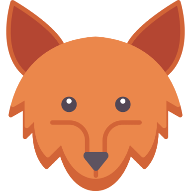 an orange fox head with a black nose