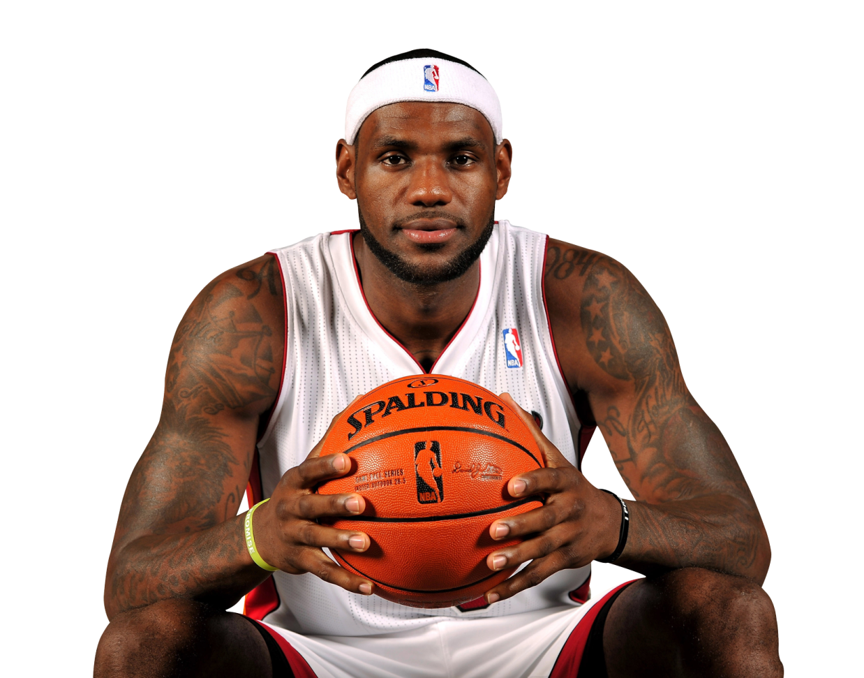 a man holding a basketball ball in his hands