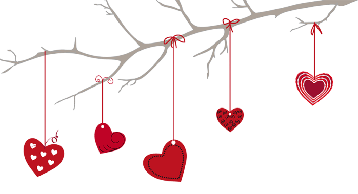a branch with hearts hanging from it