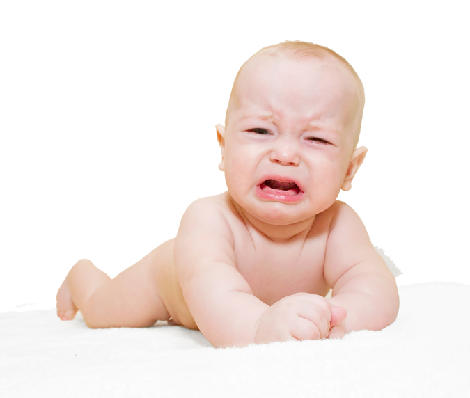 a baby laying on its back on a white blanket