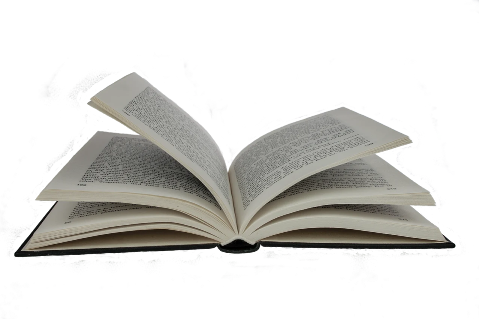 an open book on a white background