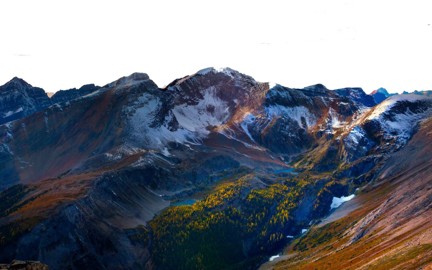 a view of the mountains from the top of a mountain
