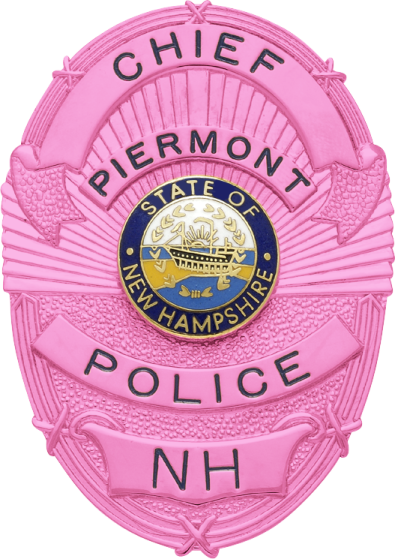 a pink badge with the words fremont police on it