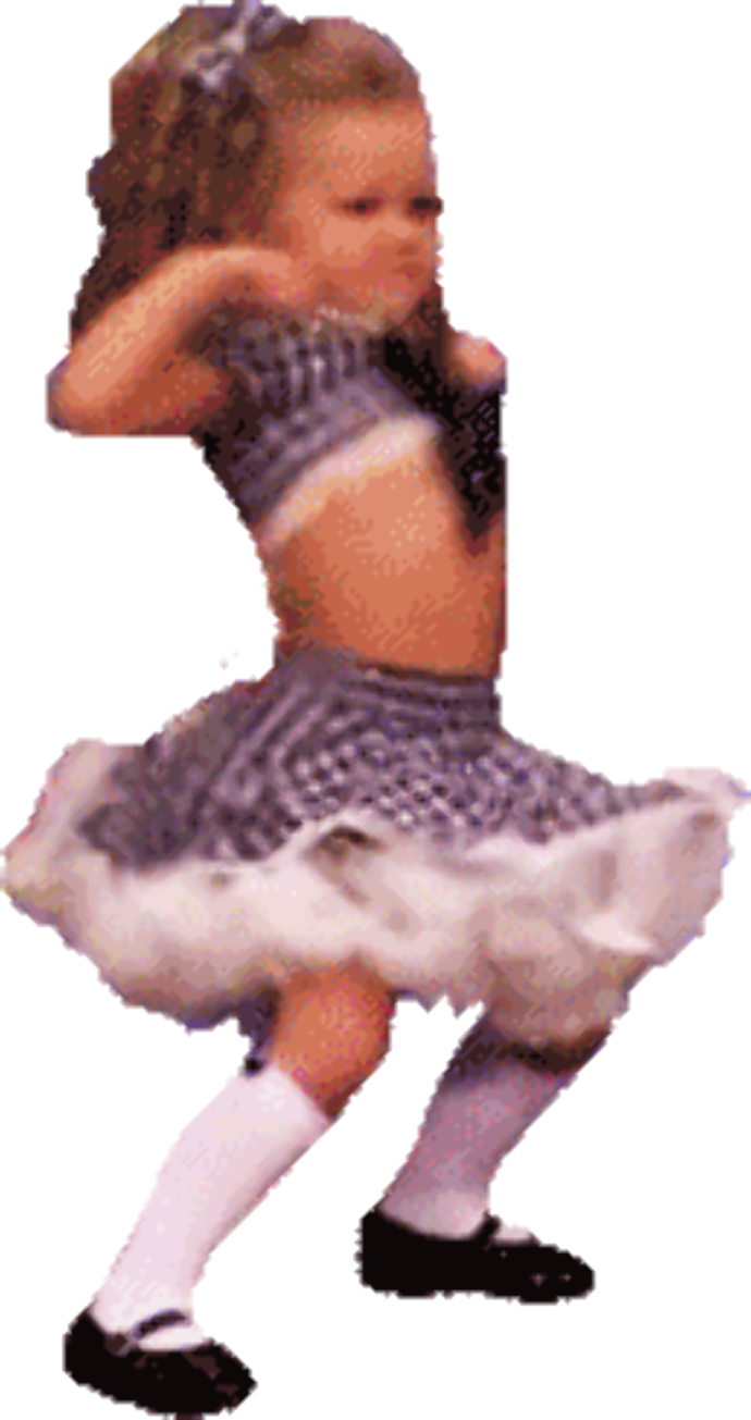 a little girl in a white dress is dancing