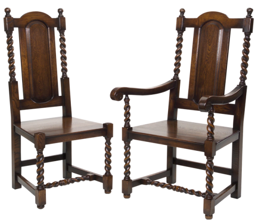 a pair of carved oak chairs