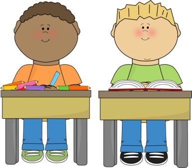two children sitting at desks with books and pencils