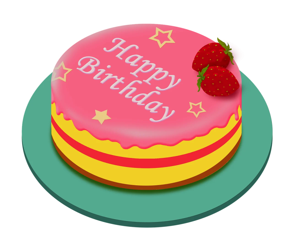 a birthday cake with a strawberry on top
