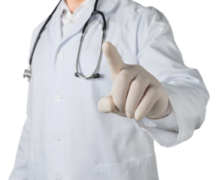 a doctor pointing at the camera with his hand