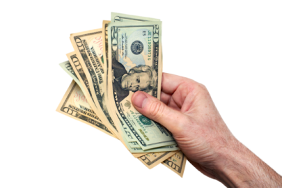 a person holding money in their hand