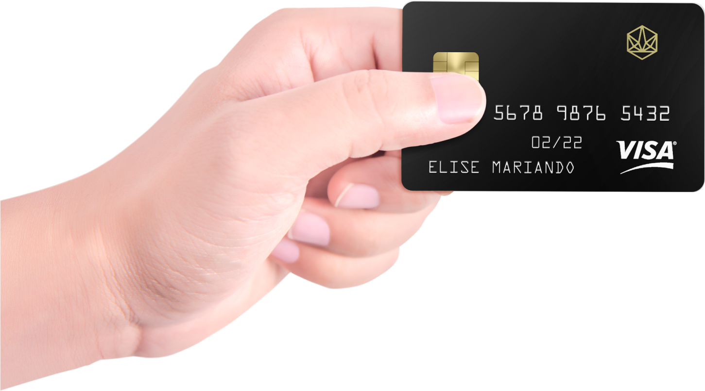 a hand holding a black credit card