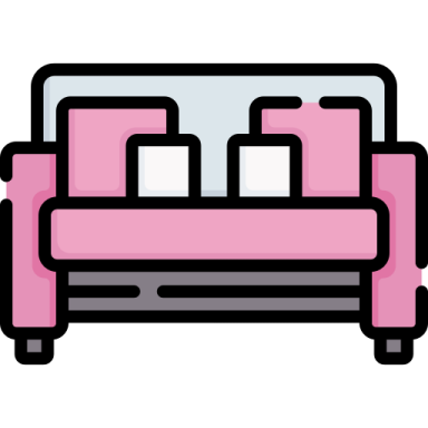 a pink couch with pillows on it