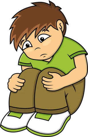 a boy with a green shirt and white pants