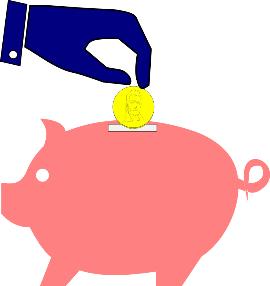 a hand putting a coin into a piggy