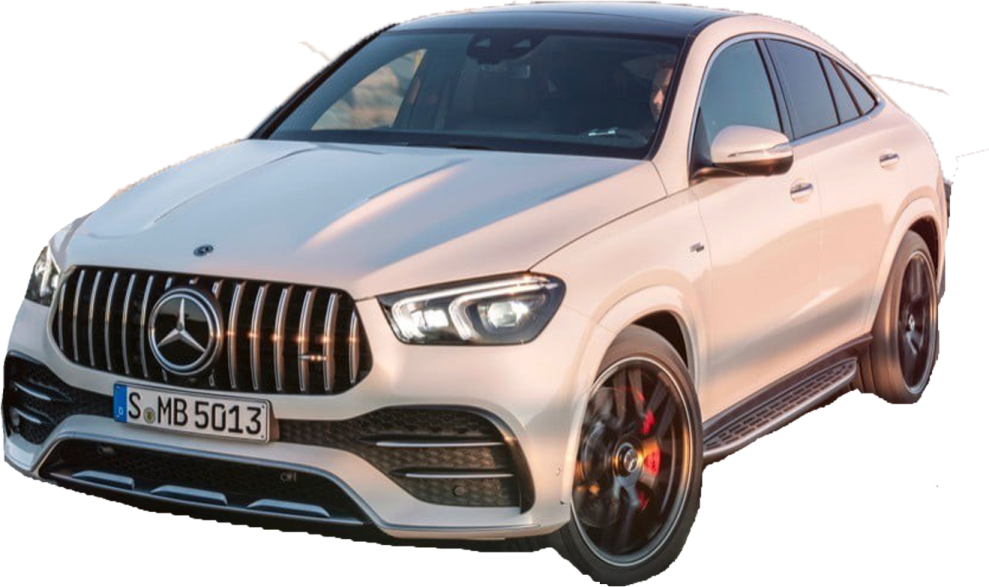 a white mercedes gle parked on a road