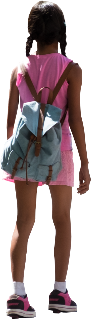 a little girl in a pink dress and white shoes