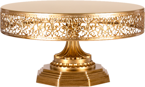 a gold cake stand on a white background