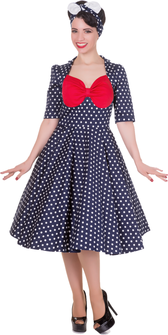 a woman in a polka dot dress