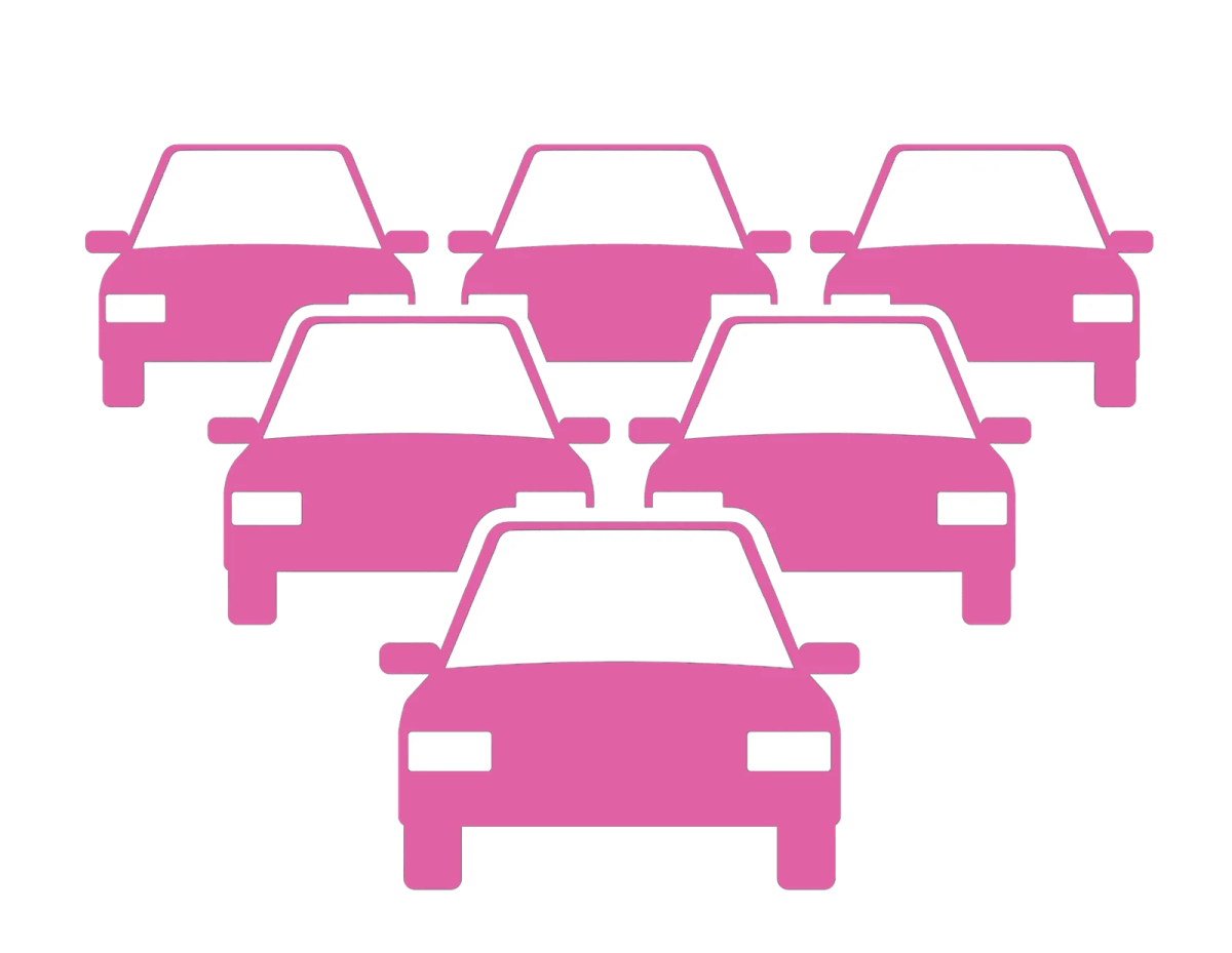 a line of pink cars