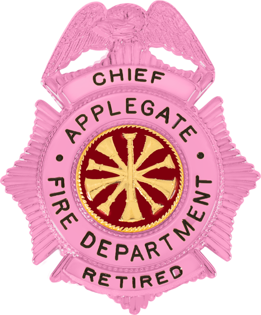 a pink badge with an eagle and the words apache fire department