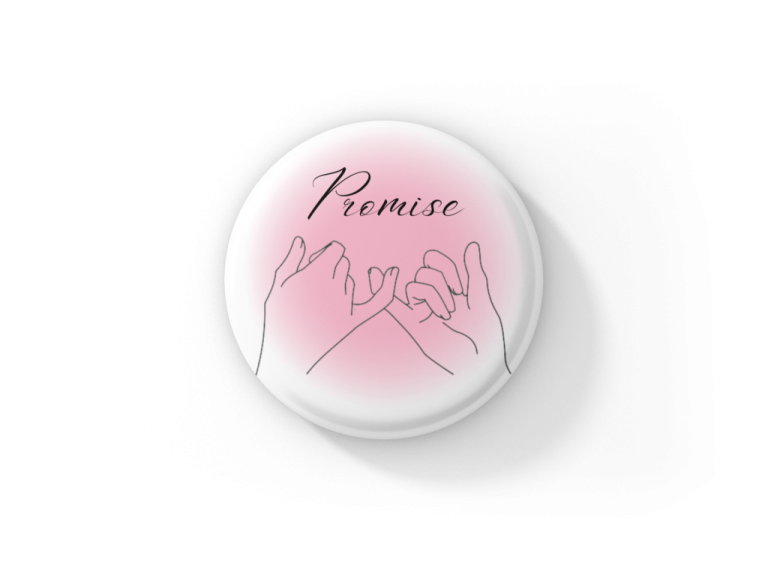 a pink button with the word peace written on it