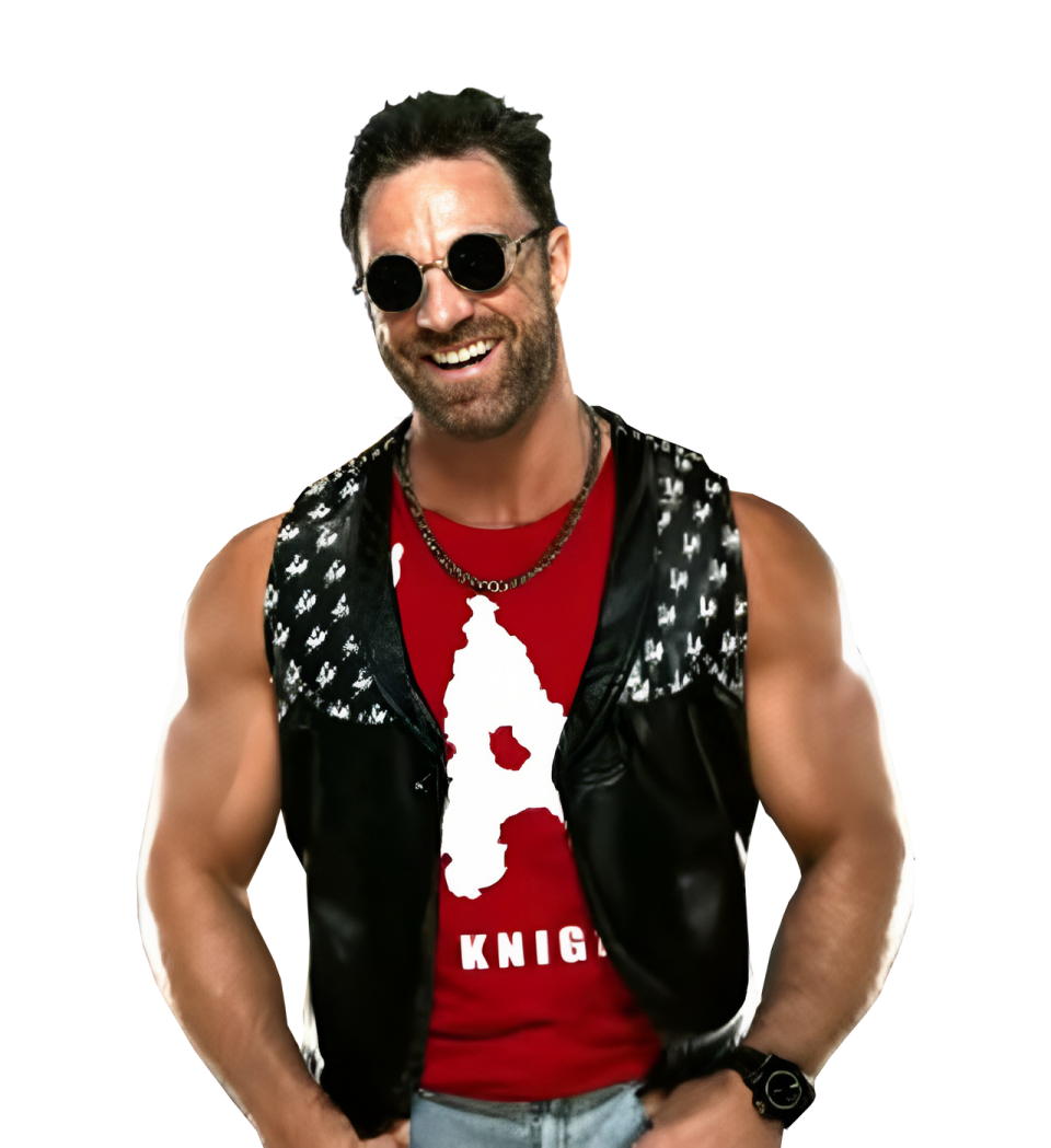 a man in a red shirt and black leather vest